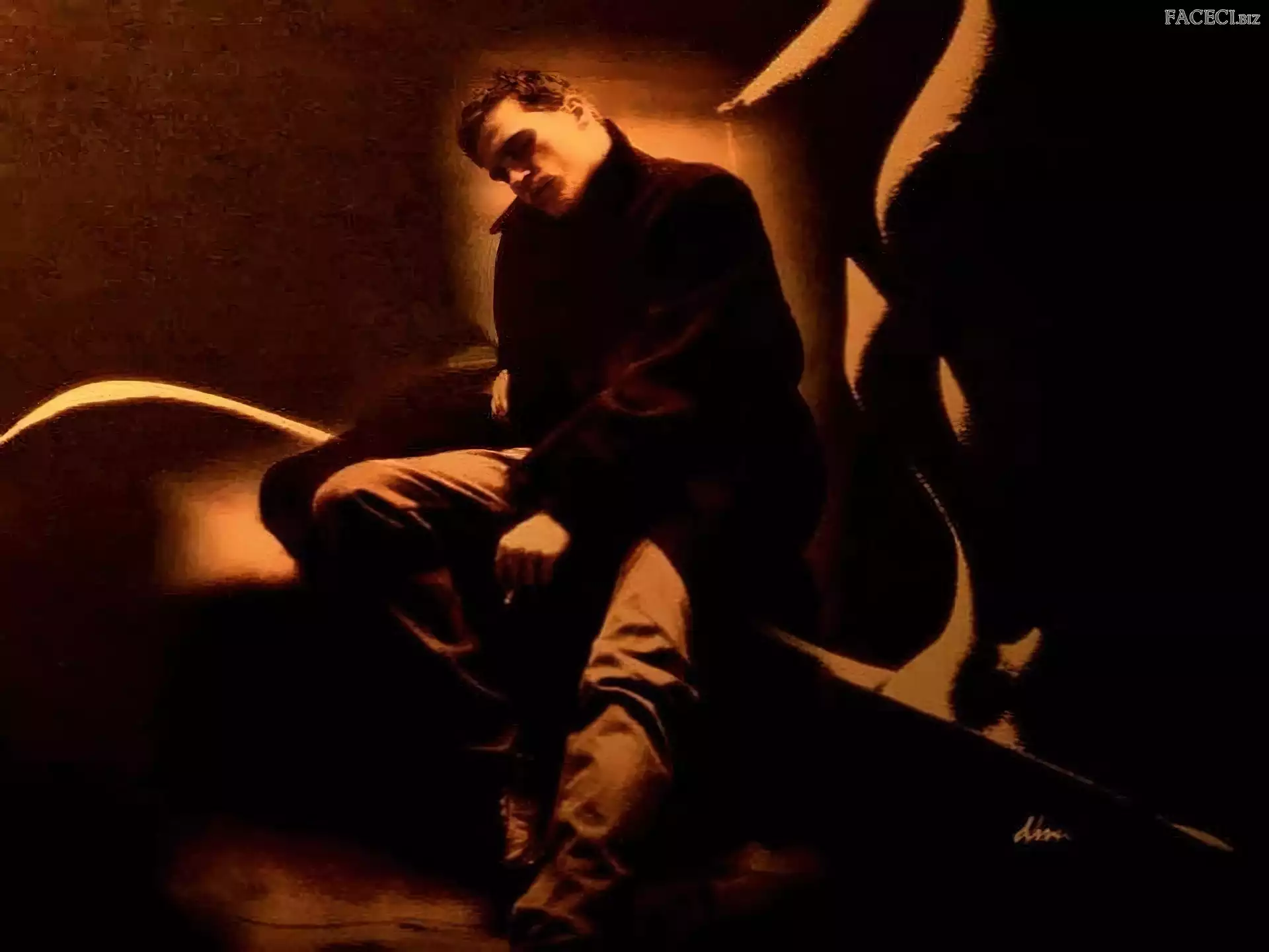 Joaquin Phoenix, czarny płaszc